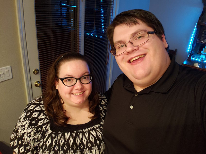 Andy smiles in a selfie with his wife, Marina.