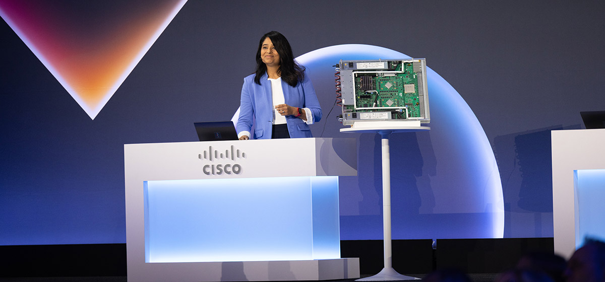 A woman presenting the inside circuit of a product